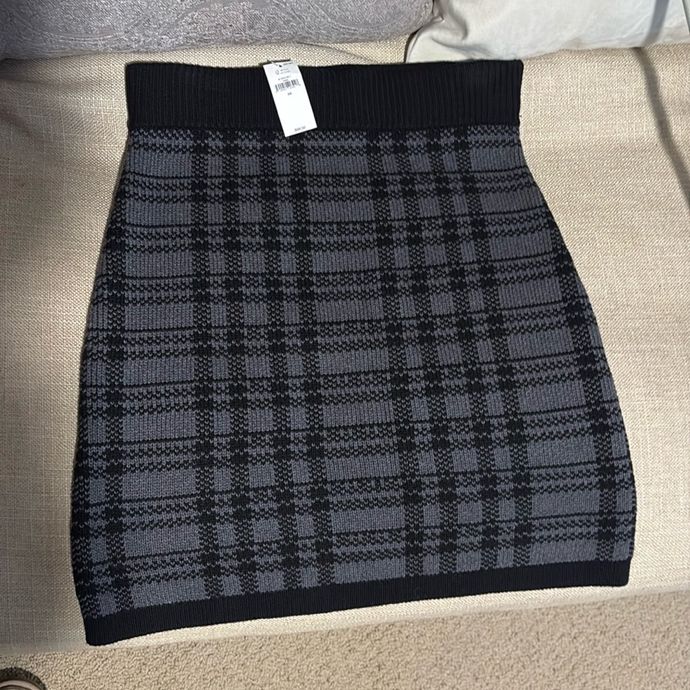 thick fitted skirt, just above knee